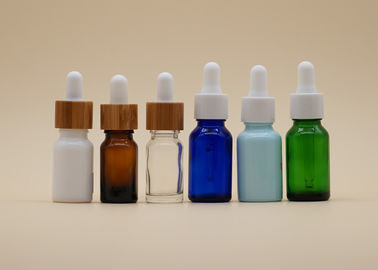 Bottiglia ceramica bianca ricoprente del contagoccia di olio essenziale di colore vuoto ambrato delle bottiglie