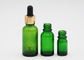 Bottiglie del contagoccia dell'olio essenziale di colore verde di cura di pelle con il contagoccia di alluminio