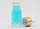 Chiara bottiglia di vetro cosmetica di forma rotonda di colore 15ml con il contagoccia dell'alluminio dell'oro