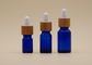 Bottiglie di vetro blu dell'olio essenziale di colore dei campioni liberi con il contagoccia di bambù