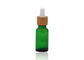 Bottiglie di vetro cosmetiche verdi del contagoccia dell'olio 18mm con la pipetta di bambù di stampa del contagoccia