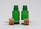 Bottiglie di vetro cosmetiche verdi del contagoccia dell'olio 18mm con la pipetta di bambù di stampa del contagoccia