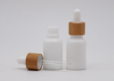 L'aromaterapia di vetro bianca della porcellana imbottiglia 30ml con il contagoccia bianco di bambù